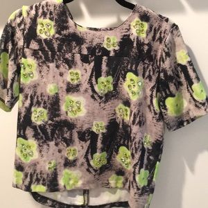 Bold Top w/ stones on front & zipper on back Sz. S